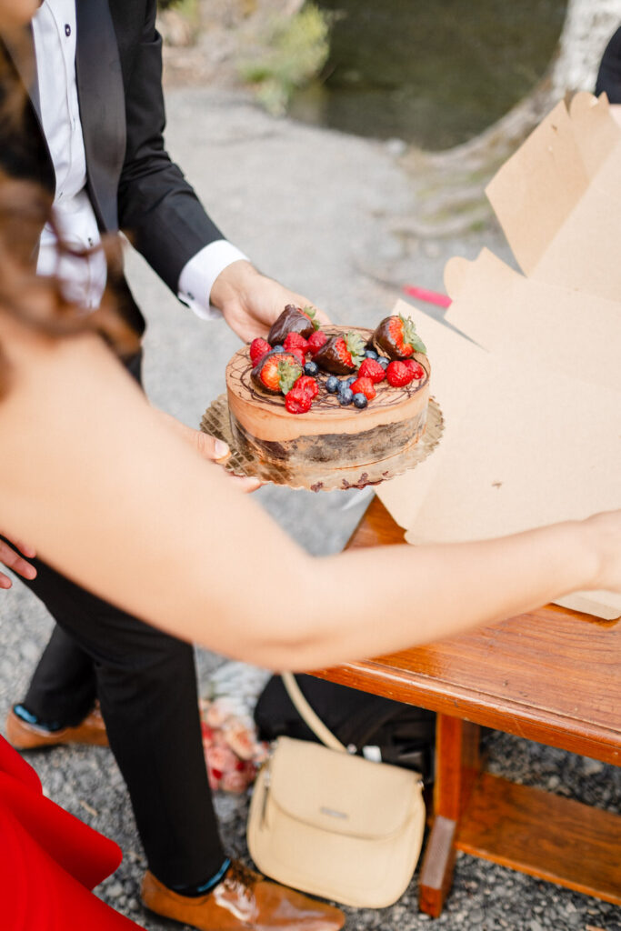 Chocolate wedding cake gets pulled out of its box