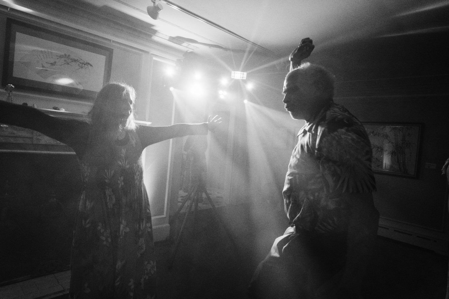The Best Documentary Wedding Photography of 2025 22 Two guests dance in soft light during a late night wedding reception