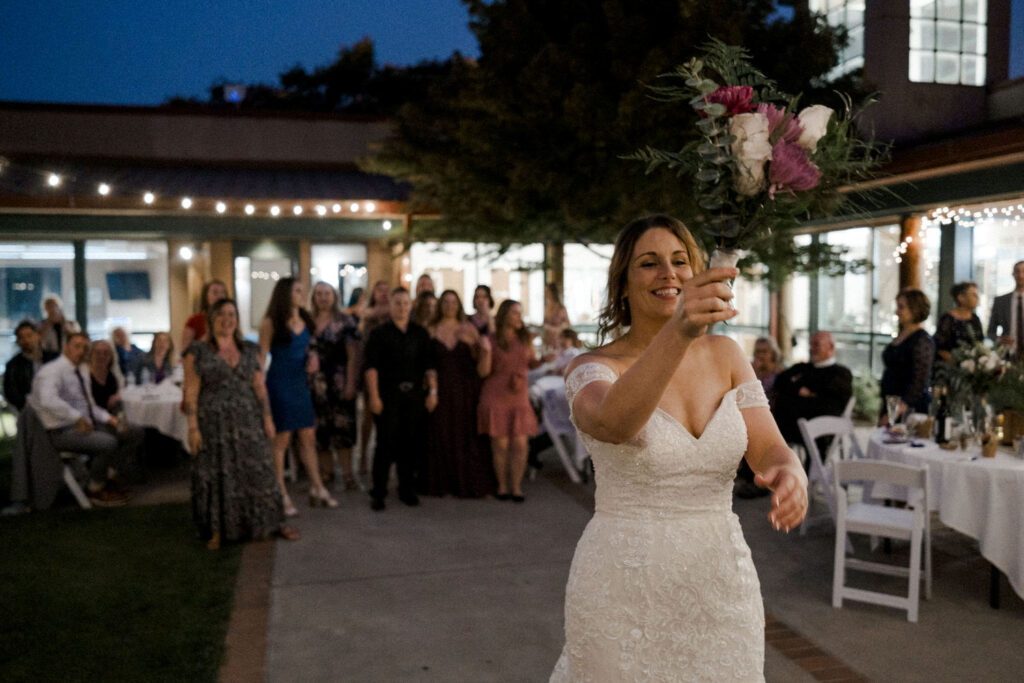 Bride tosses the bridal bouquet
