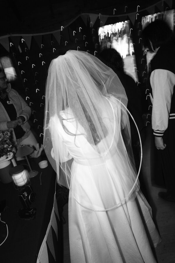 Olympic National Park Wedding | Sara and Robert's Summer Camp Wedding Weekend at NatureBridge 44 Bride in veil dancing during wedding reception inside rustic summer camp lodge