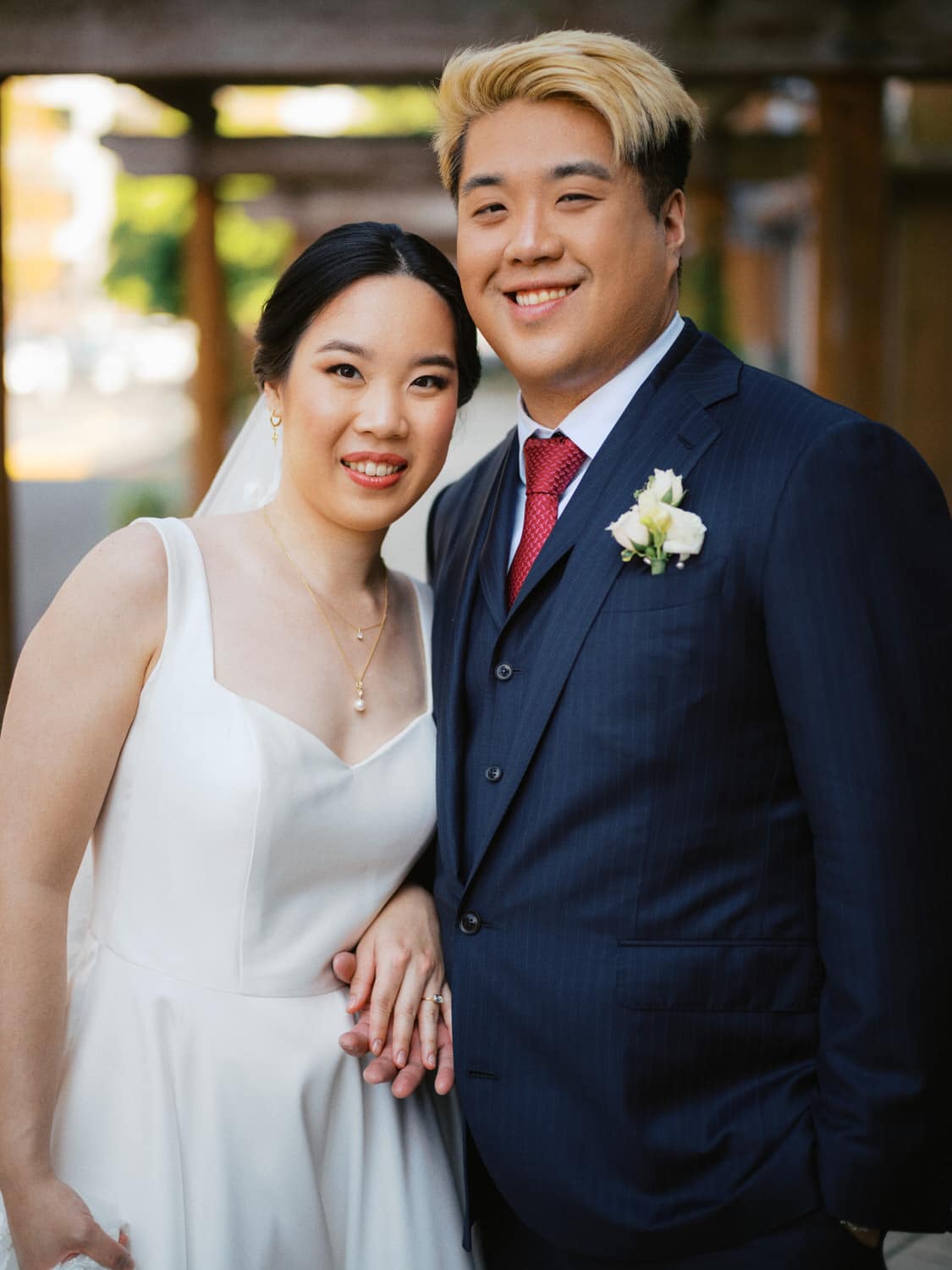 The Edgewater Hotel Wedding | Candid Seattle Wedding Photography for Amy & Mike 10 Bride and Groom posing for a portrait outside the Edgewater Hotel in Seattle, WA
